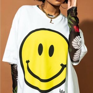 Dressed in LaLa the world needs your magic oversized tee small/medium